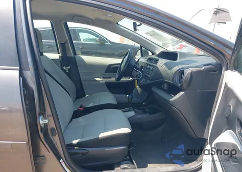 2014 Toyota Prius C One z USA, uszkodzony, nr VIN JTDKDTB39E1567900